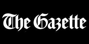 The logo for the gazette is white on a black background.