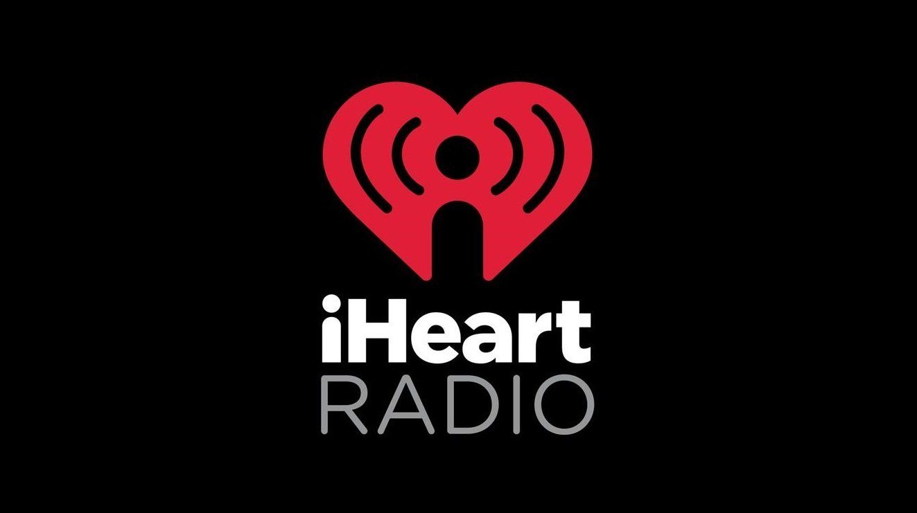 A logo for iheart radio on a black background