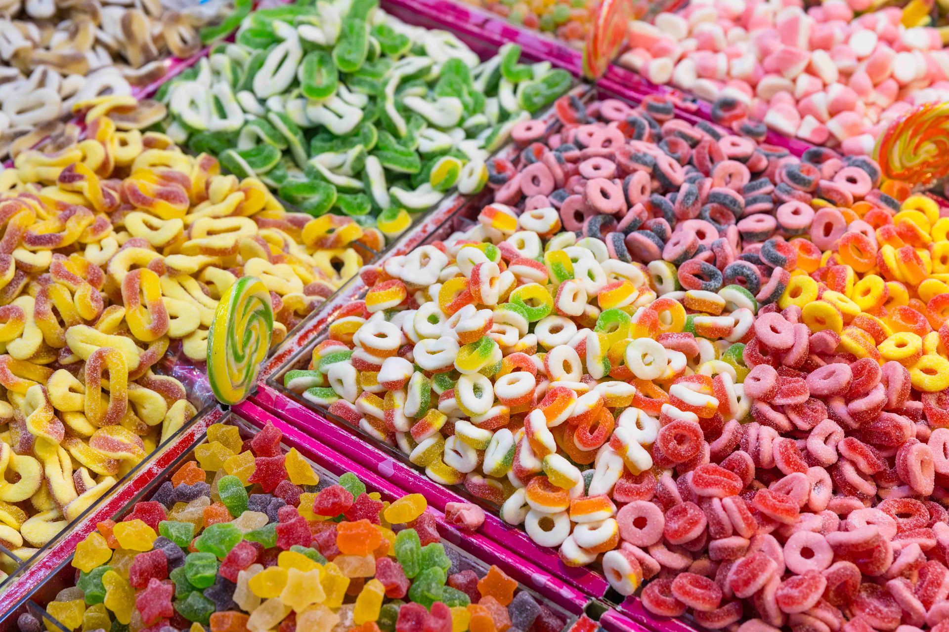There are many different types of candy in the shape of letters and numbers.