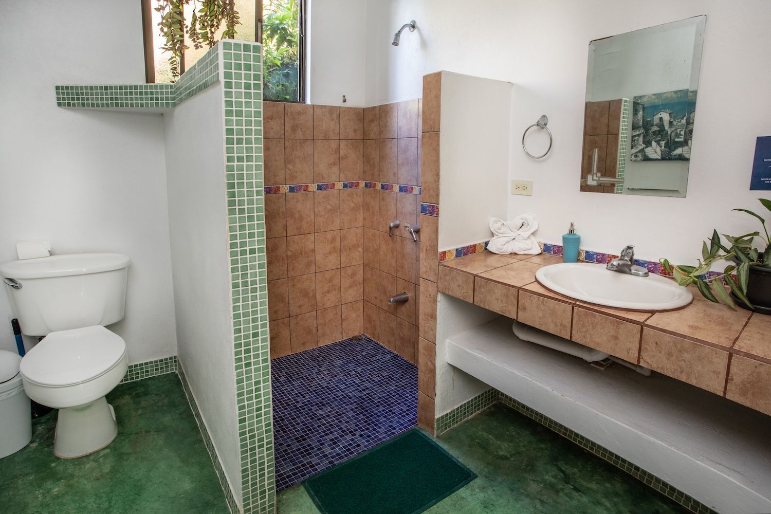 private room with two twin beds and a shared bathroom