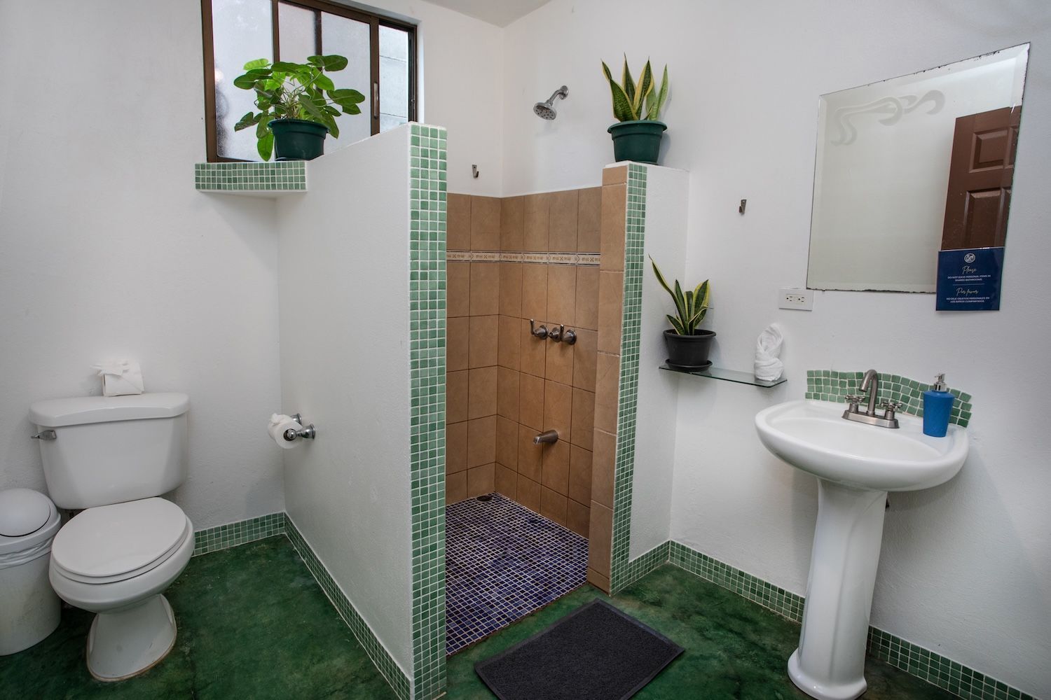 private room with two twin beds and a shared bathroom