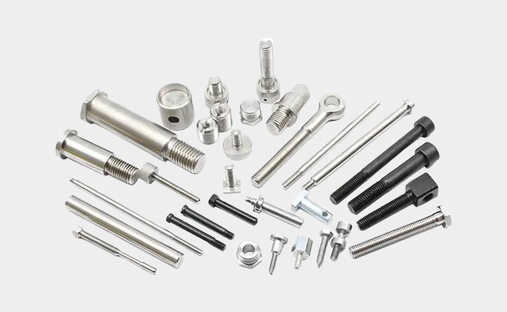 A collection of stainless-steel fasteners, including bolts, nuts, and screws.