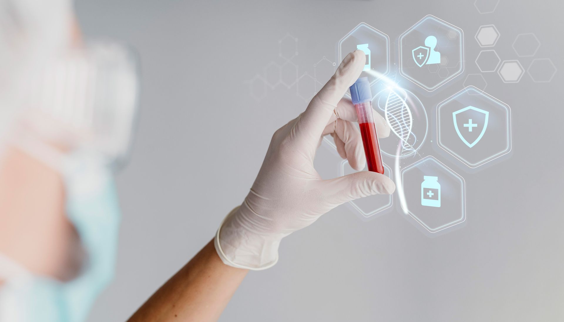 Life Science - Scientist holding a test tube in a life science lab with digital health icons.