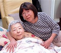 Senior Patient on Bed – La Quinta, CA – C'e Bella Home Care