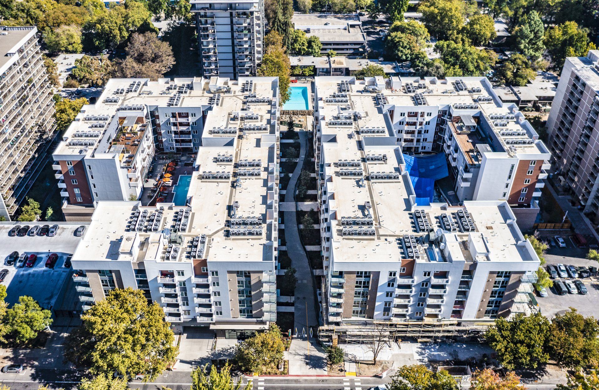 An aerial view of a large apartment building in a city at Capitol Towers.