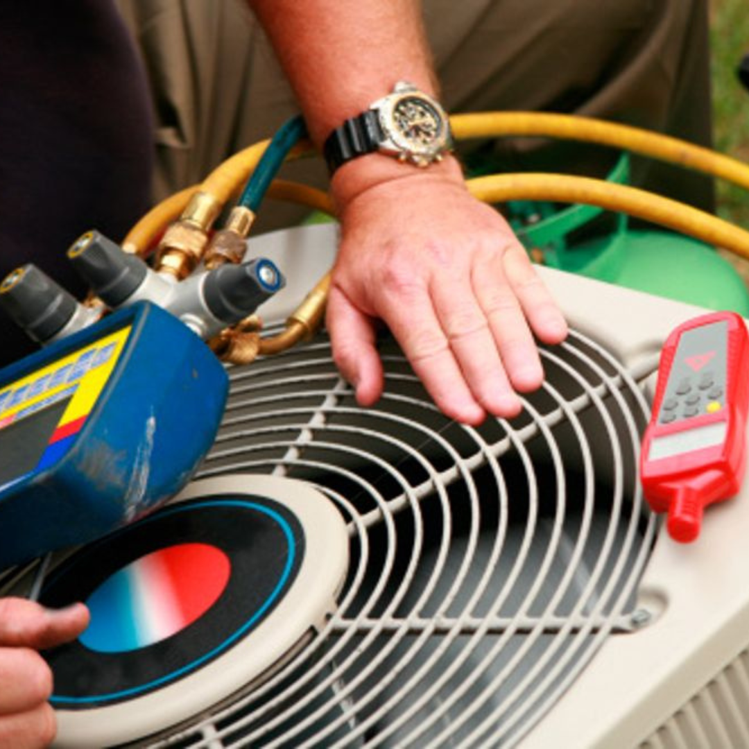 Michigan Air Care - working on an air conditioner