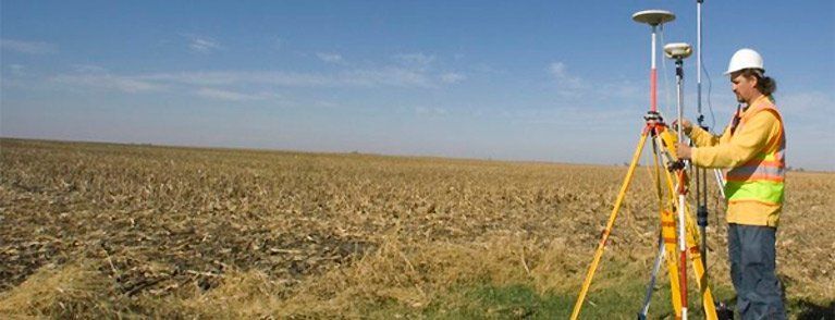 One of our property surveyors in Noosa