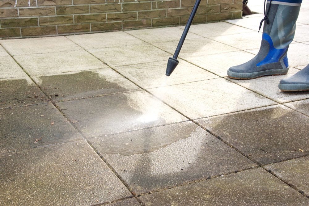 Outdoor Concrete Floor Cleaning With High Pressure Washer — High Pressure Cleaning Service In Tamworth, NSW