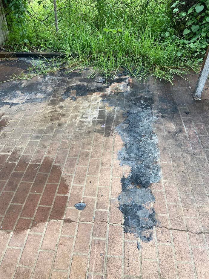 Before Cleaning The Oil Stain — High Pressure Cleaning Service In Tamworth, NSW