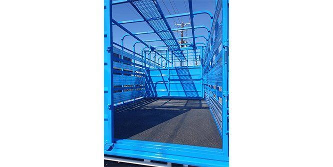 The Inside of a Blue Truck With a Fence on It — Roll Press NT In Tivendale, NT