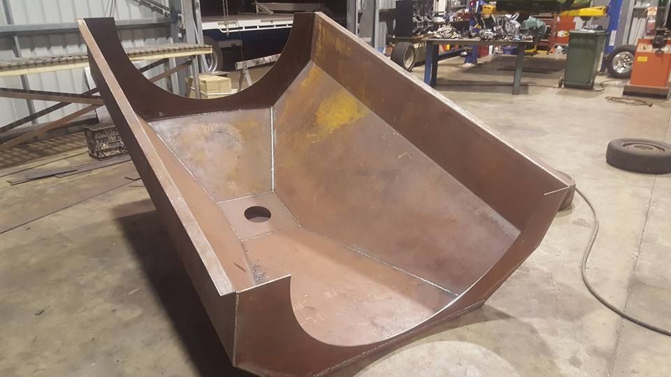 A Large Piece of Metal is Sitting on the Floor in a Factory — Roll Press NT In Berrimah, NT