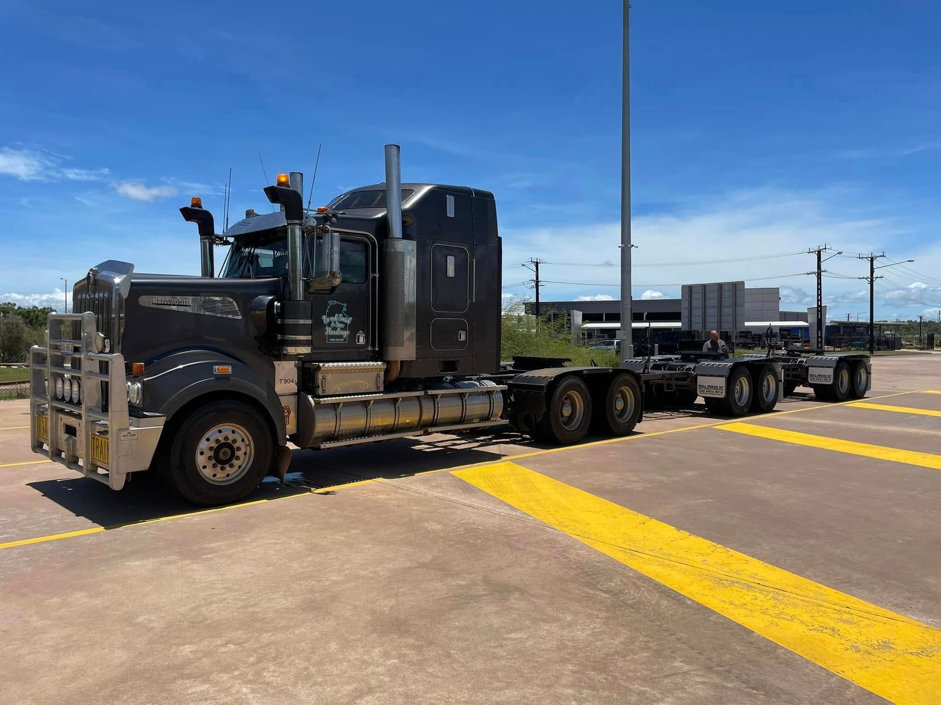 A Large Semi Truck is Parked in a Parking Lot — Roll Press NT In Palmerston, NT