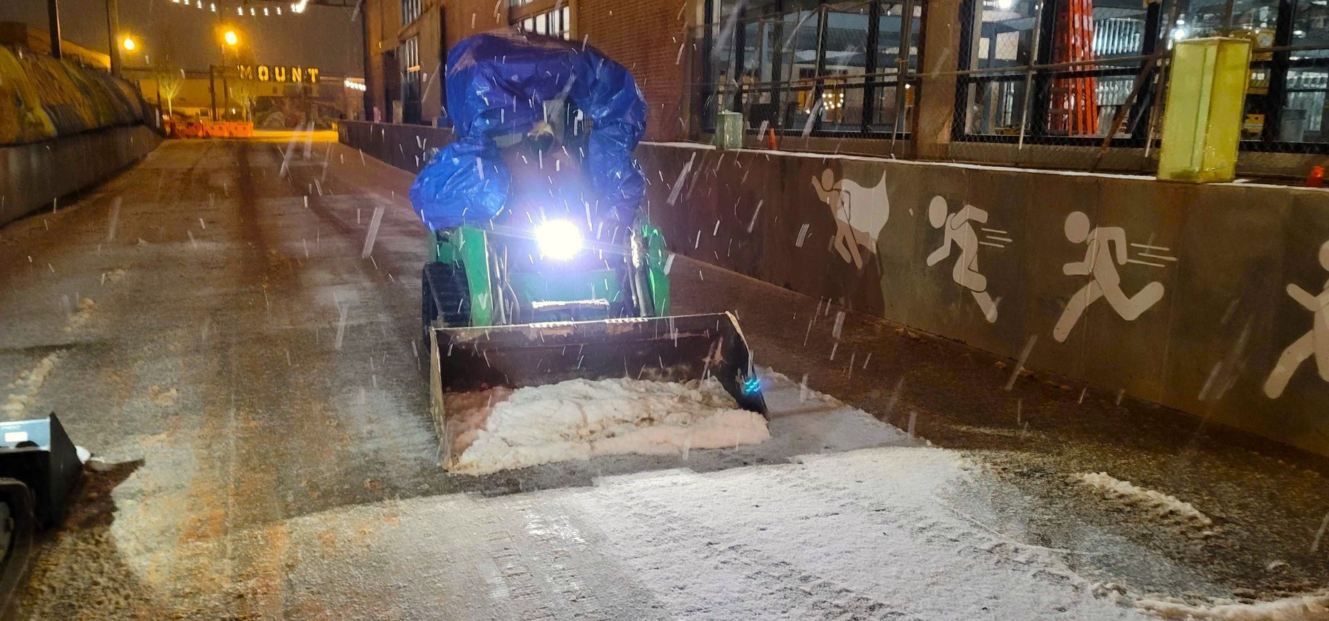 A snow plow in Charlotte, NC by Haven Landscape Design