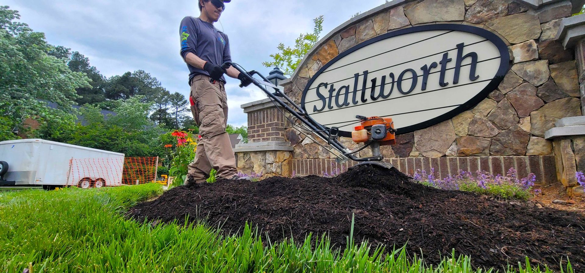 A landscape maintenance in Charlotte, NC - Haven Landscape Design hard at work