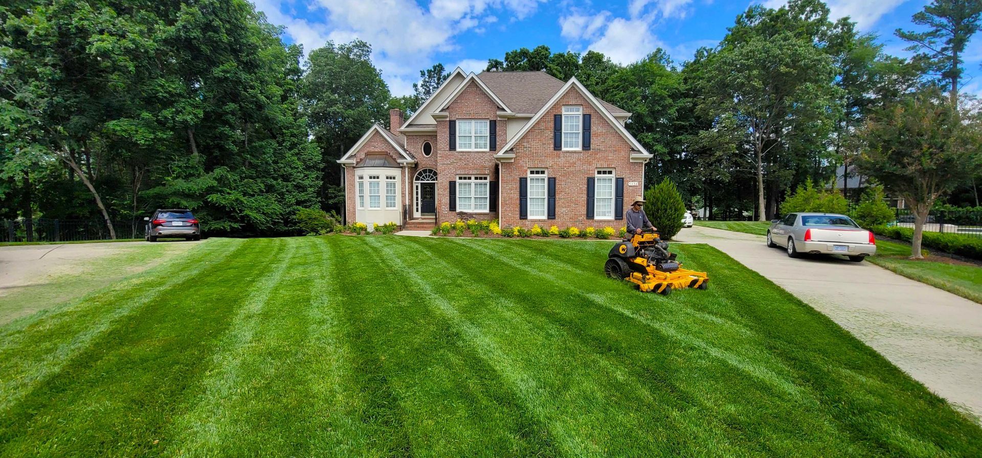 A landscape maintenance in Charlotte, NC - Haven Landscape Design hard at work