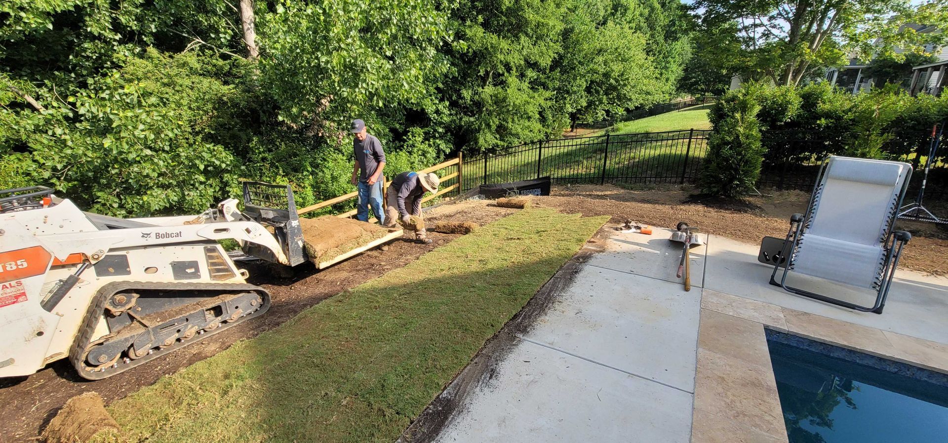 A sod installation in Charlotte, NC - Haven Landscape Design hard at work