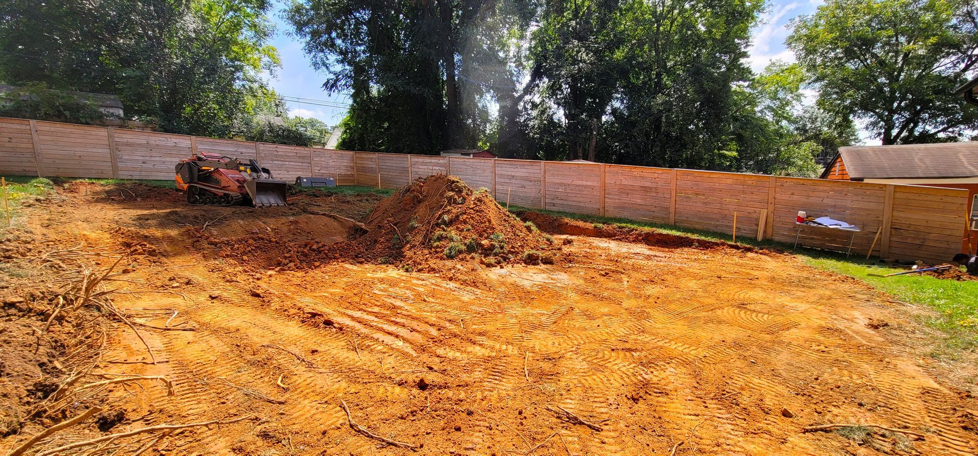 A home in Charlotte, NC getting prepped for sod installation - Haven Landscape Design hard at work.