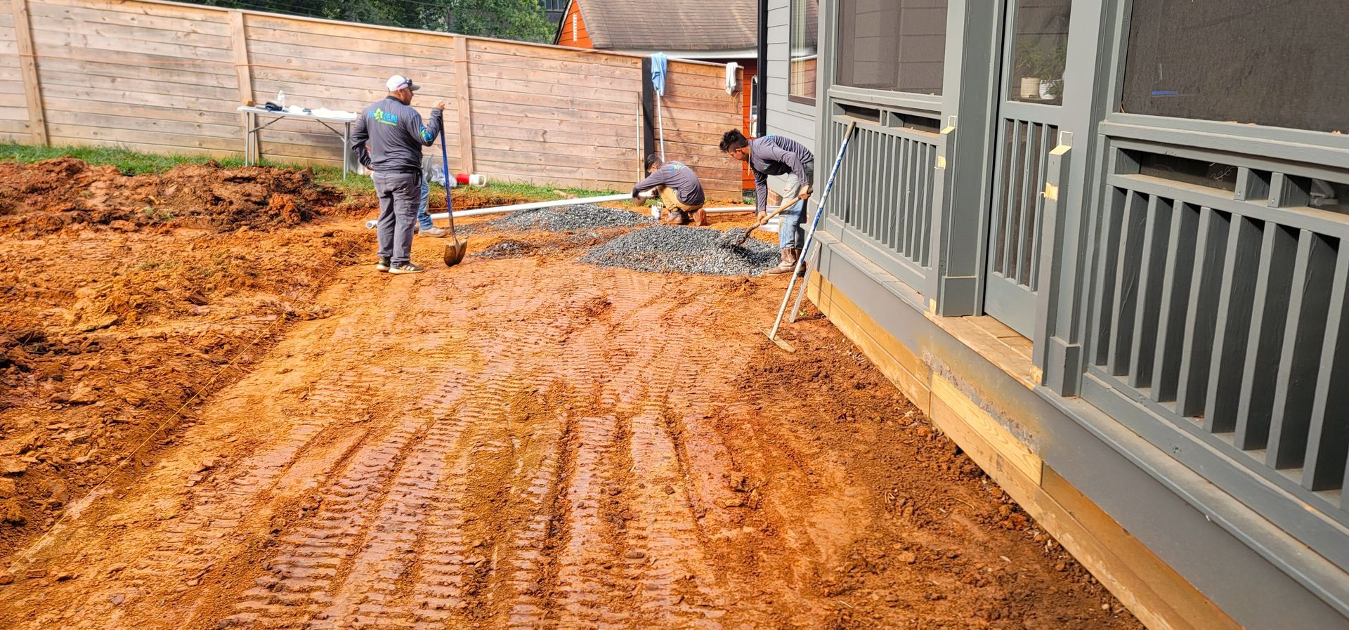 A home in Charlotte, NC getting an origami landscape installation - Haven Landscape Design hard at work.