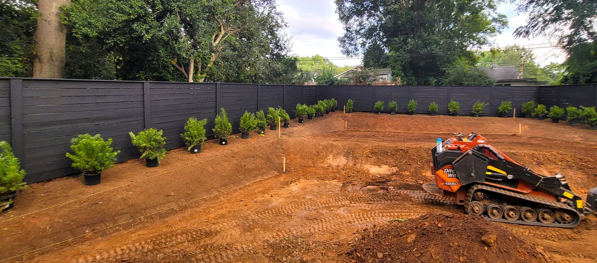 A home in Charlotte, NC getting prepped for sod installation - Haven Landscape Design hard at work.