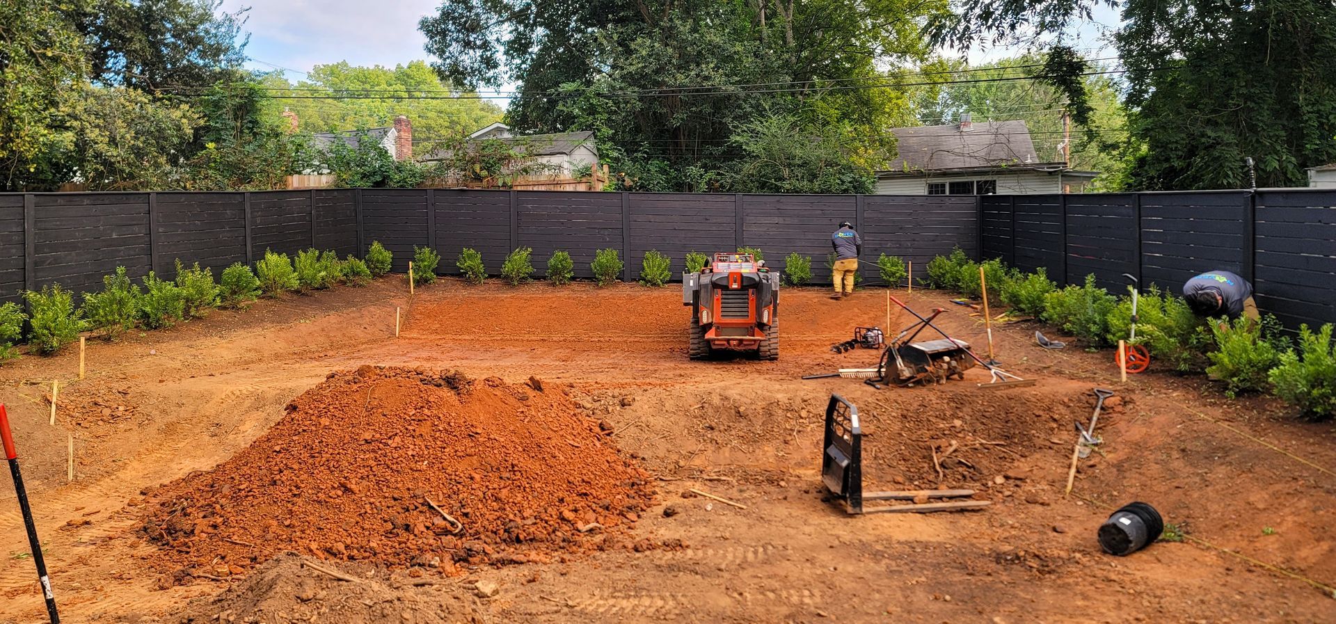 A home in Charlotte, NC getting prepped for sod installation - Haven Landscape Design hard at work.