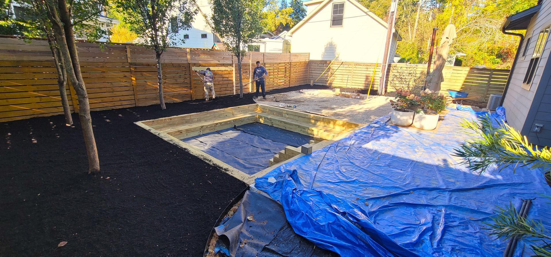 A residential landscape design project in Charlotte, NC - Haven Landscape Design hard at work