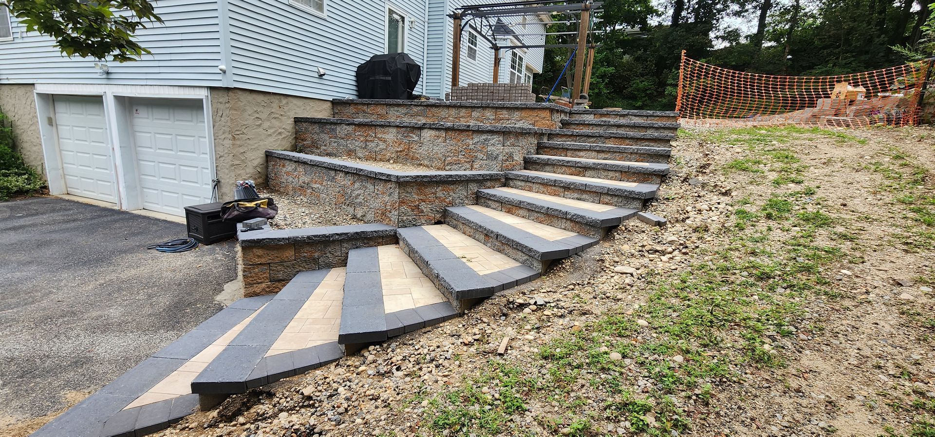 A set of stairs leading up to a house.