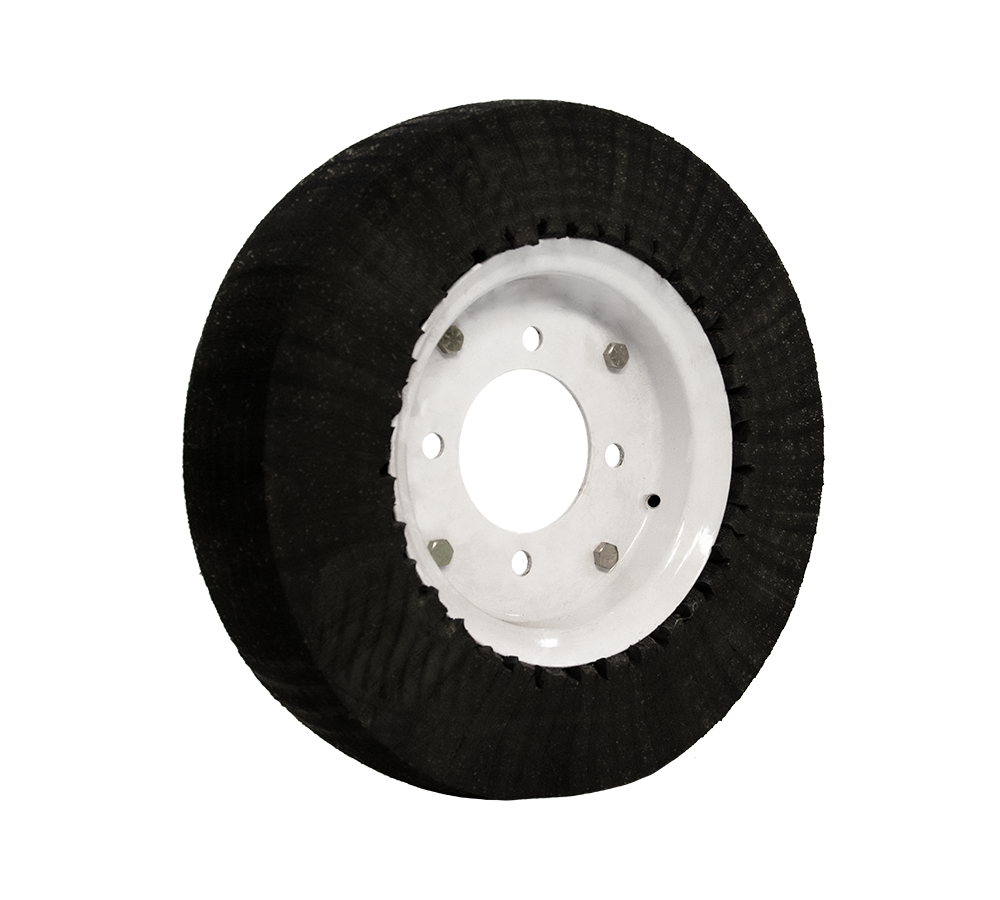 A black laminated tire with a white rim on a white background