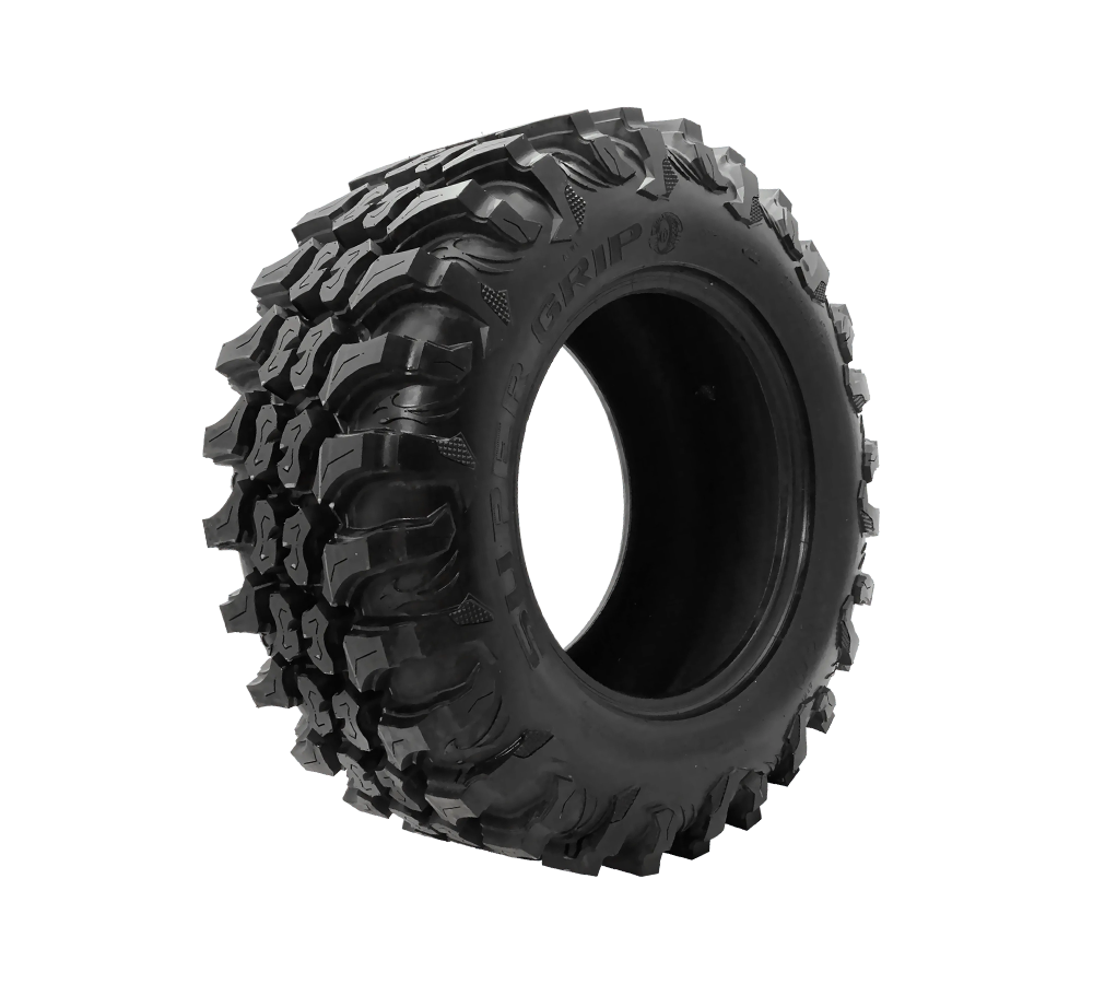 A close up of a mini truck tire on a white background