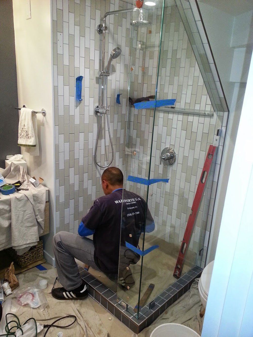 Man Working on Bathroom — El Sobrante, CA — Wadsworth Glass Inc.