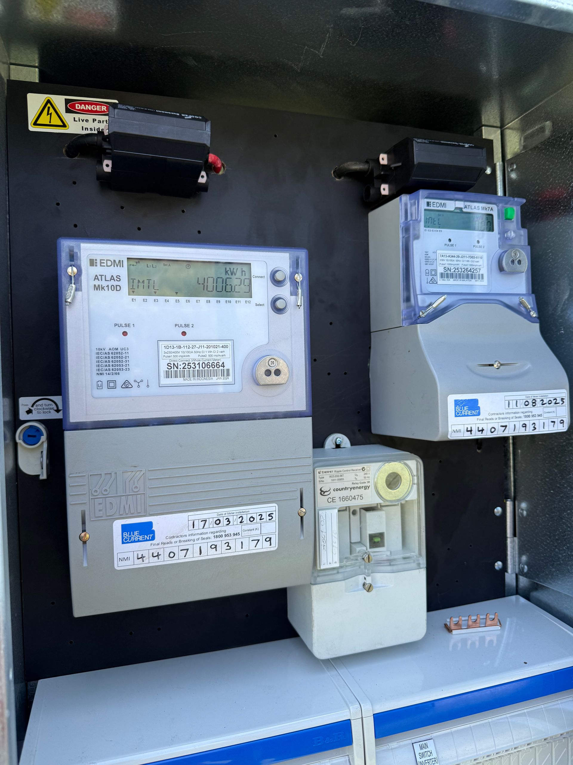 Electrical Meters Mounted Inside a Metal Cabinet — CDT Electrical in Tweed Heads, NSW