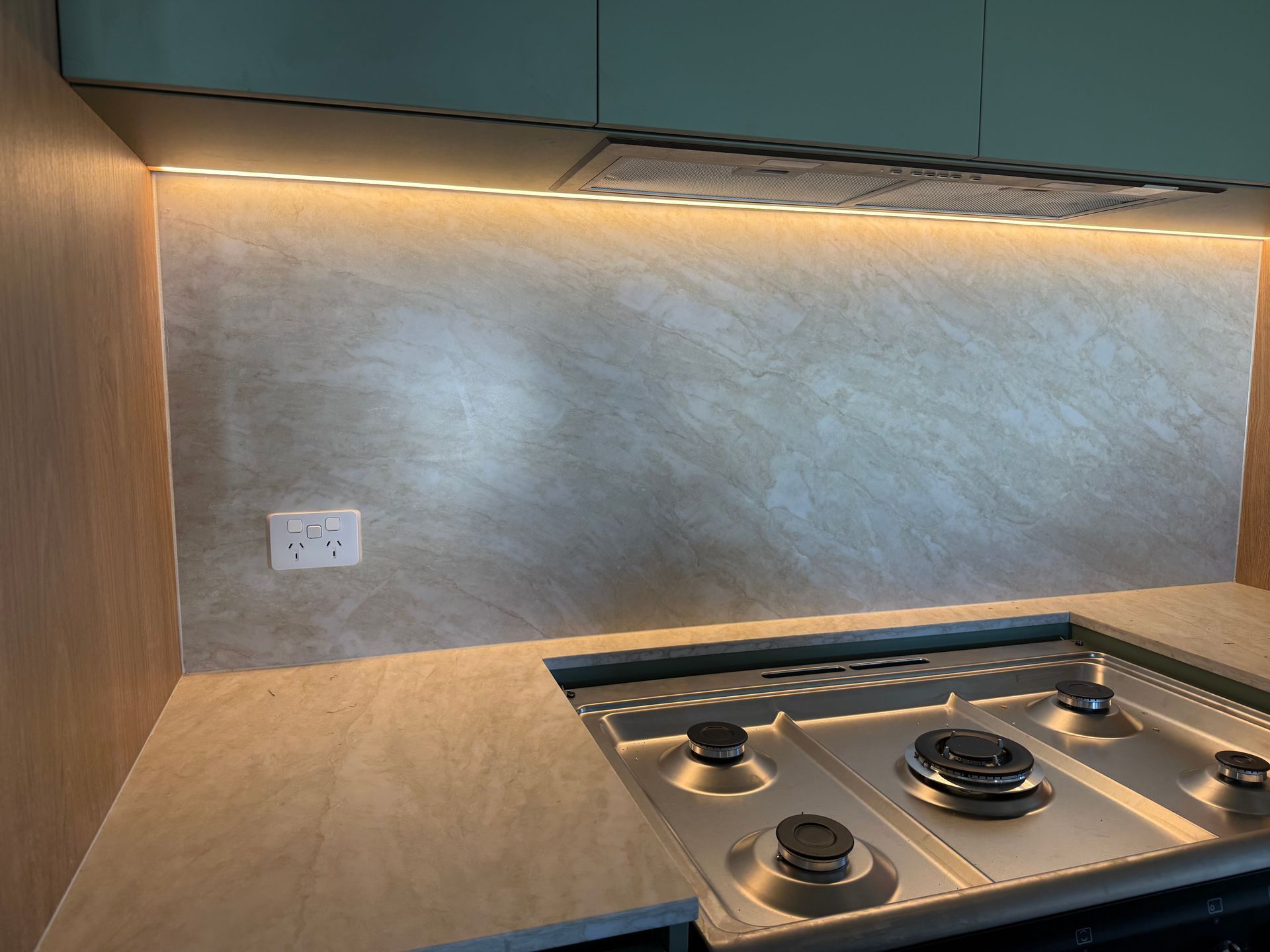 Kitchen With Stovetop, Backsplash, Countertop, and Overhead Lighting — CDT Electrical in Ballina, NSW