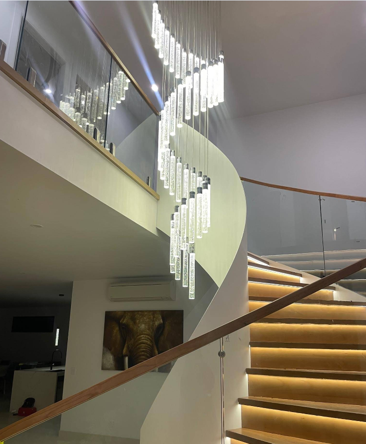 Spiral Staircase With a Decorative Hanging Light Fixture — CDT Electrical in Lennox Head, NSW