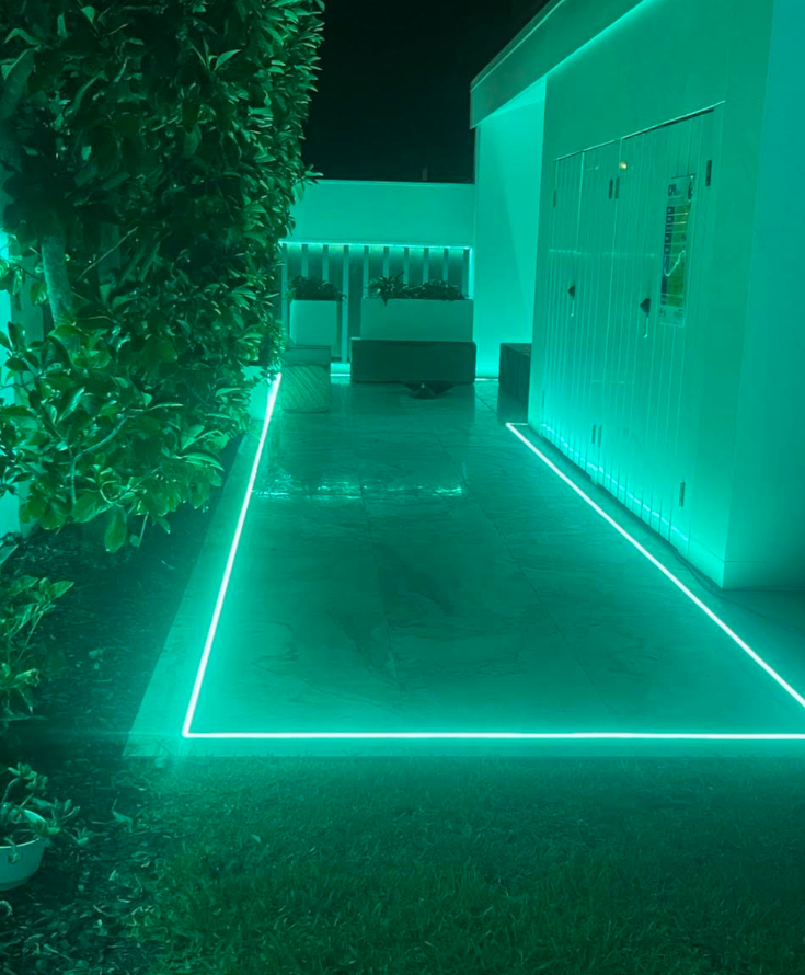Green Neon Lights Outlining a Patio and Walls at Night  — CDT Electrical in Lennox Head, NSW