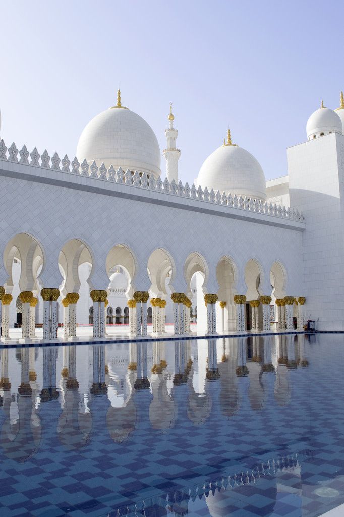 Abu Dhabi - Iconic landmarks like Sheikh Zayed Grand Mosque, modern skyscrapers, cultural sites, and beautiful waterfronts.