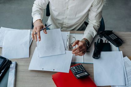 person organizing desk