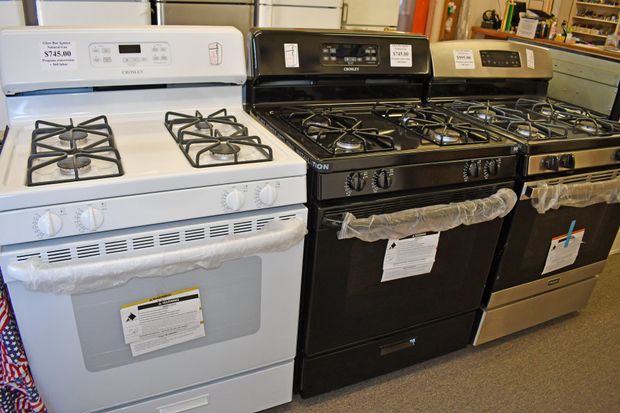 Three different gas stove's designs.