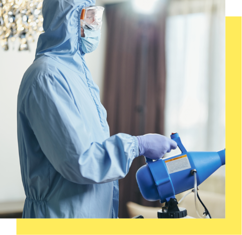 technician-disinfecting-room