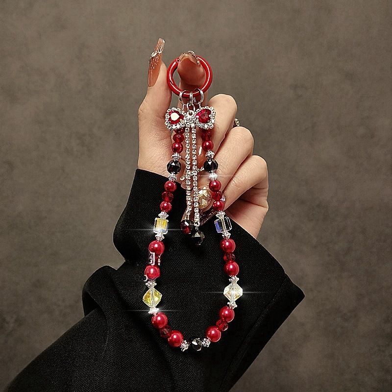 潮流時尚 輕奢水鑽蝴蝶結手機吊鏈 買一送一