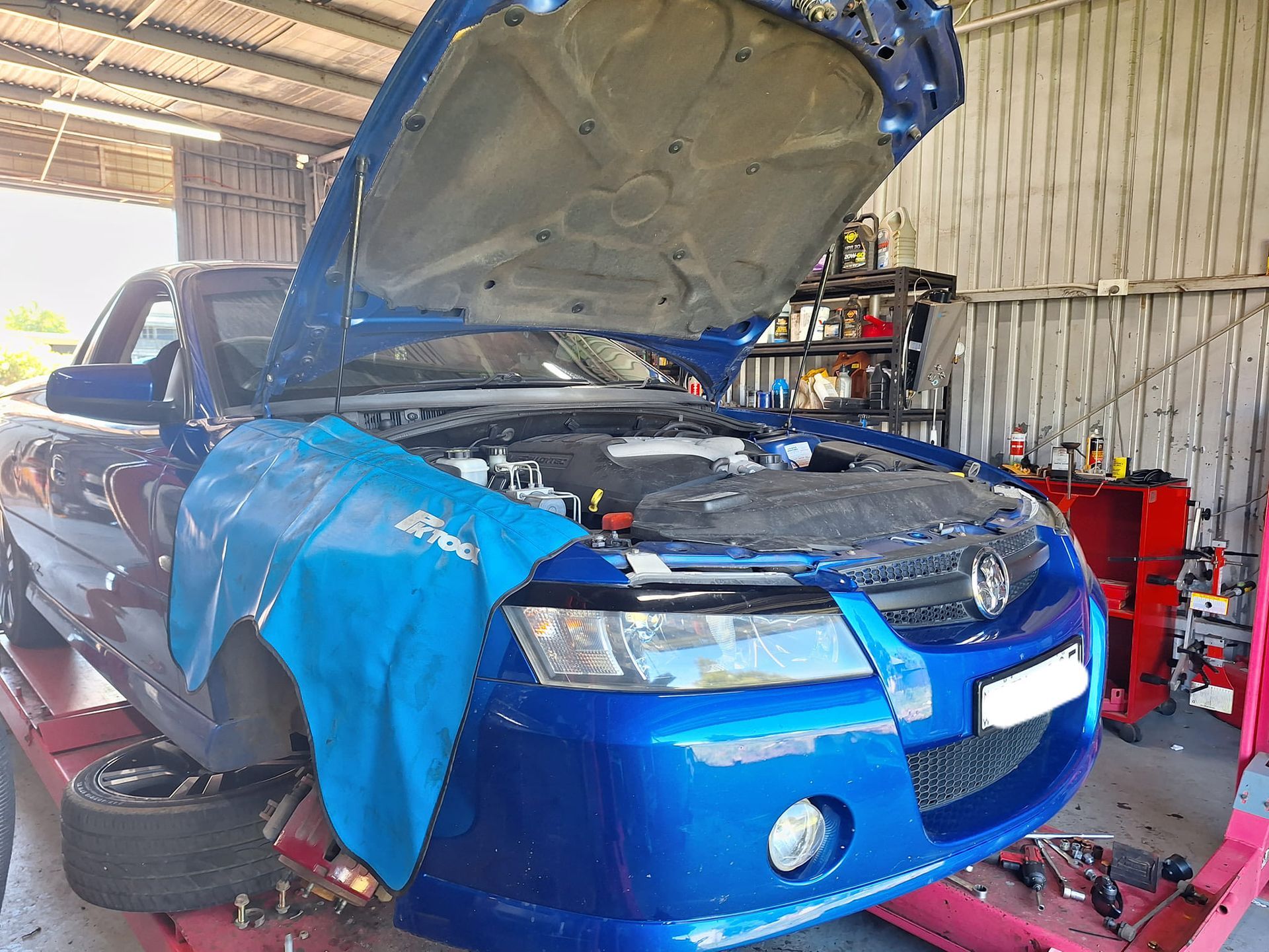 Blue Car With Hood Open — Coopers Auto Care in South Lismore, NSW