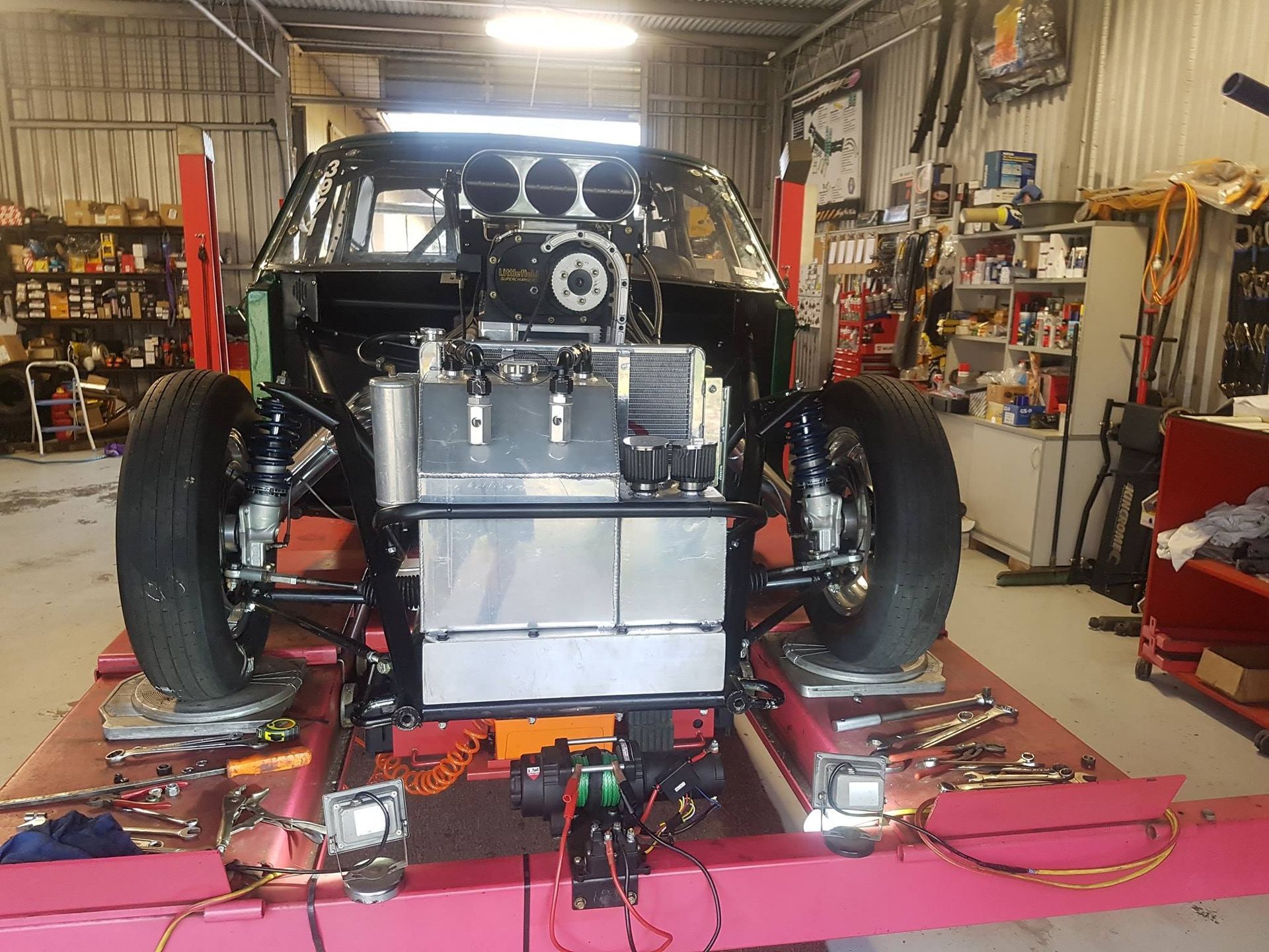Drag Racing Car on a Lift — Coopers Auto Care in South Lismore, NSW