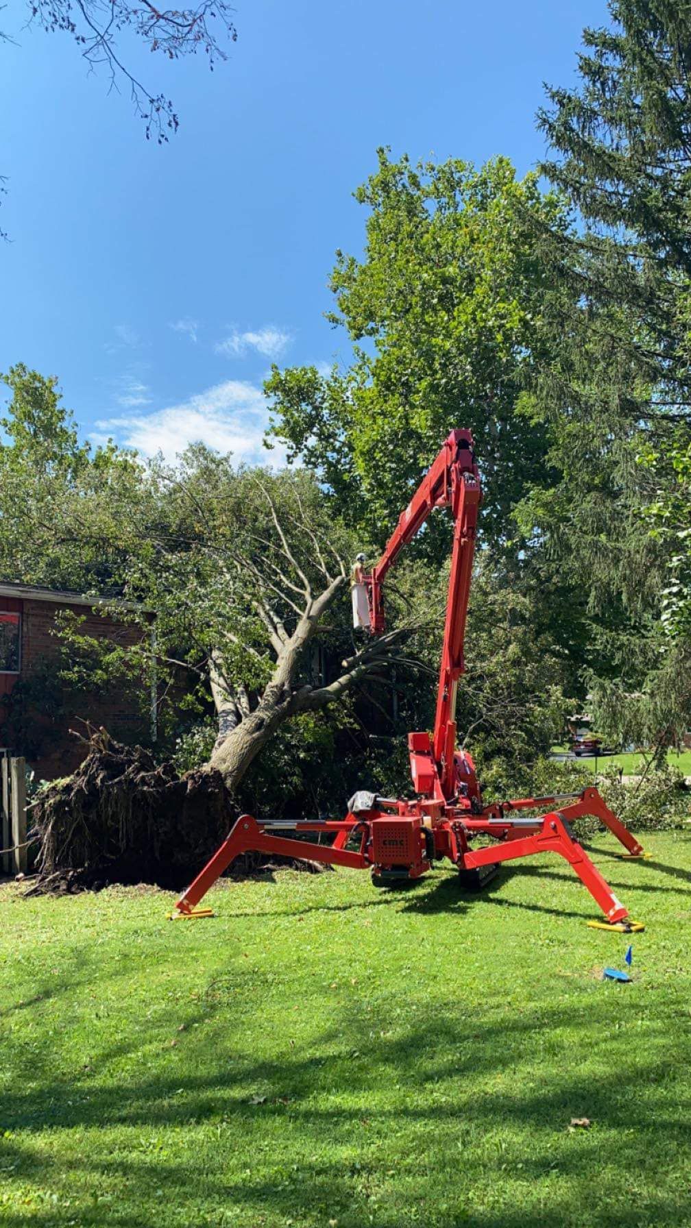 Orange Lifter Machine — Springfield, OH — C&S Tree Service Center