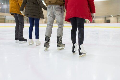 Skating Rinks — Family Enjoying Ice Skating in Manchester, CT