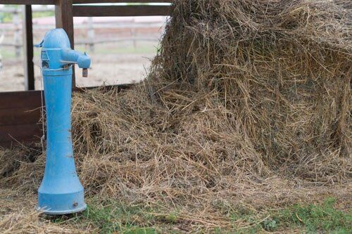 Wells — Blue Outdoor Water Pump in Manchester, CT