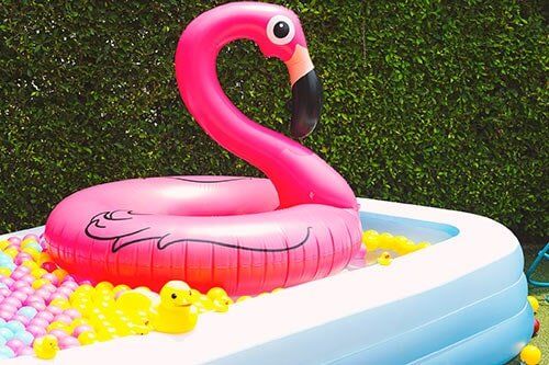 Outdoor Swimming Pool — Blow Up Pool with Inflatable Flamingo in Manchester, CT