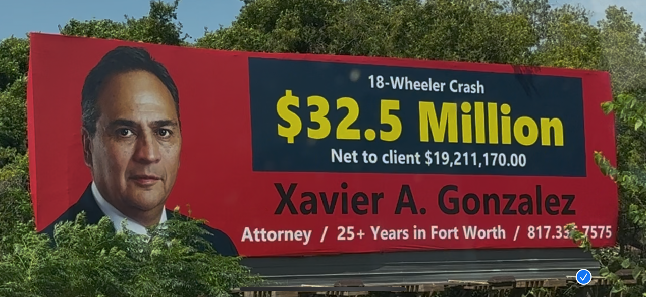 Billboard with man’s portrait advertising $32.5 million net to client and Xavier A. Gonzalez attorney services.