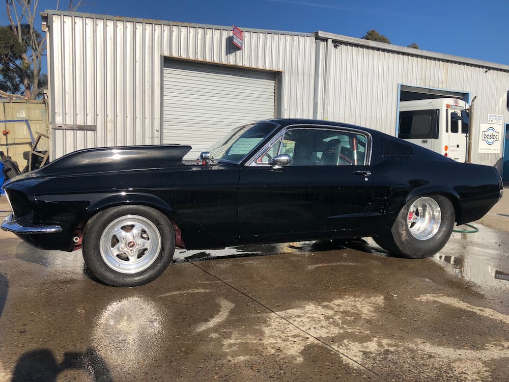 Black Mustang Side View — Panel Beating & Restoration Services in Port Macquarie, NSW