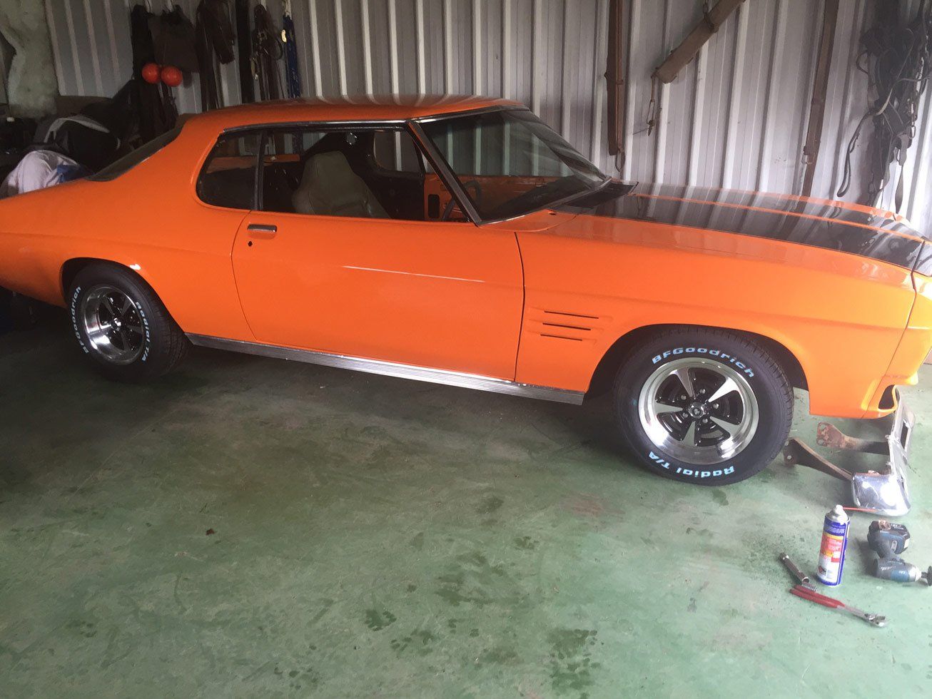 Orange Car Inside Garage — All Port Smash Repairs in Port Macquarie, NSW