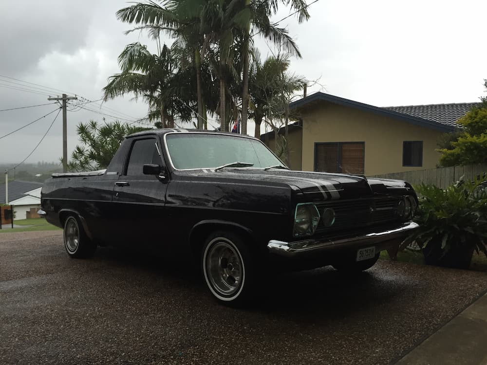 Black Vintage Car with Racing Stripes — All Port Smash Repairs in Port Macquarie, NSW