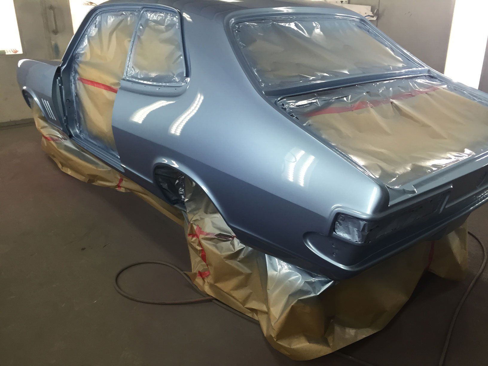 Car Painting Process — Panel Beating & Restoration Services in Port Macquarie, NSW