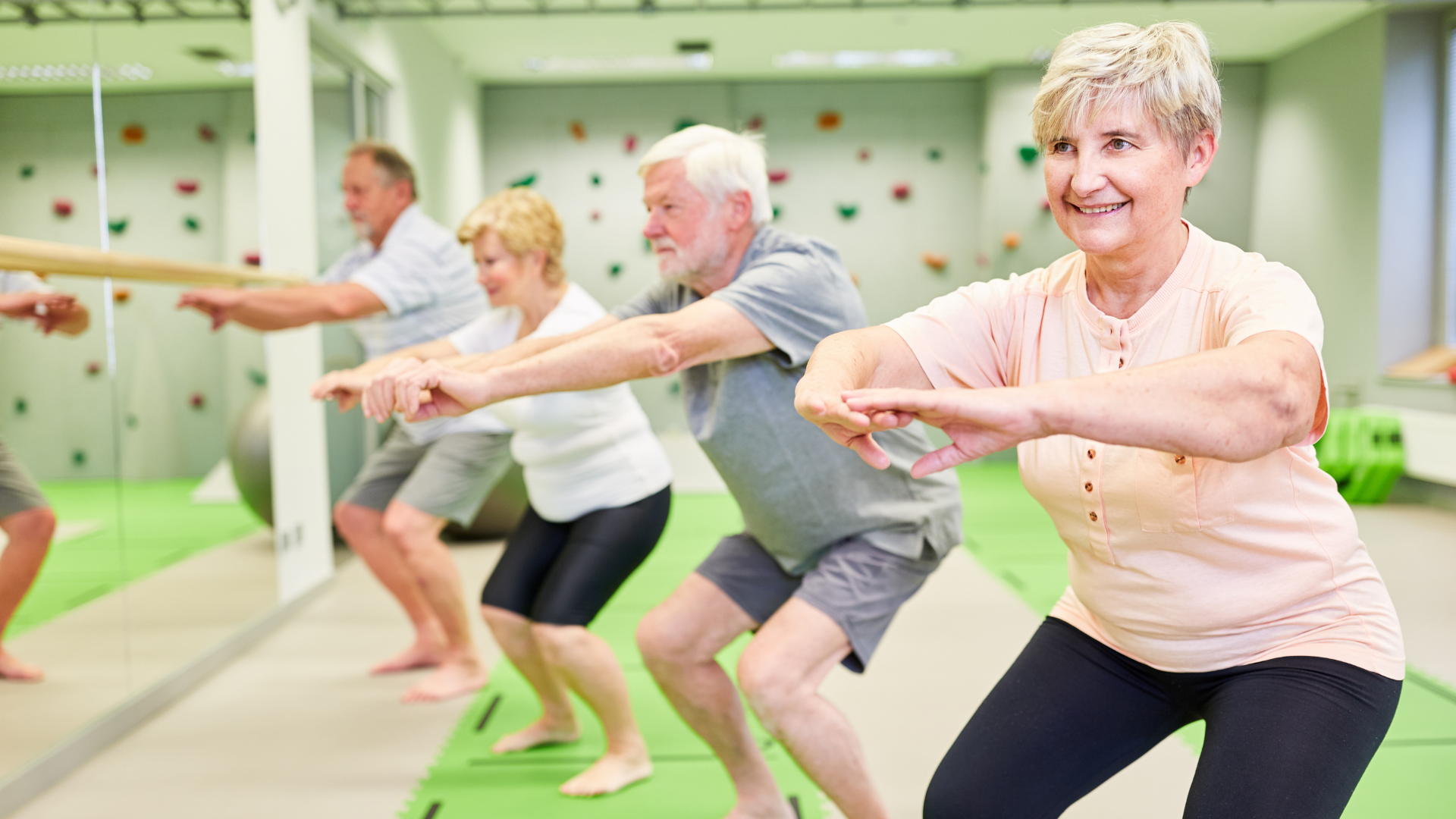 two senior citizens exercising and smiling